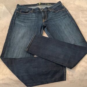 7 for all mankind jeans, the slim cigarette style. Darker wash slight fade.